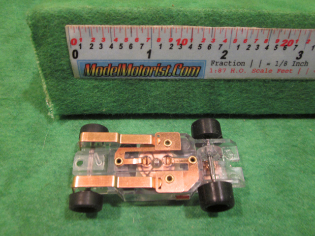 Bottom view of Dash T 2.0 Transparent ABS HO Slot Car Chassis
