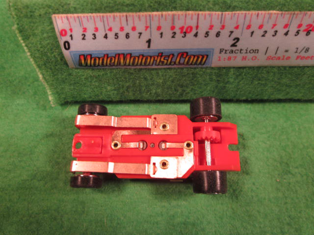 Bottom view of Dash IROC Red (Correct) HO Slot Car Chassis