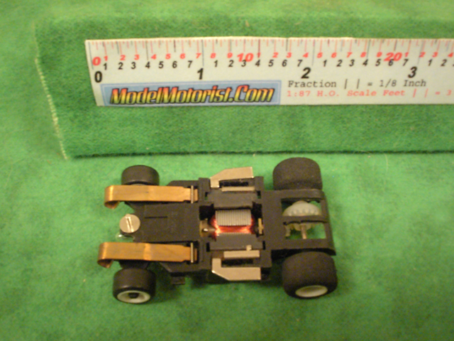 Bottom view of Amrac Lighted HO Scale Slot Car Chassis