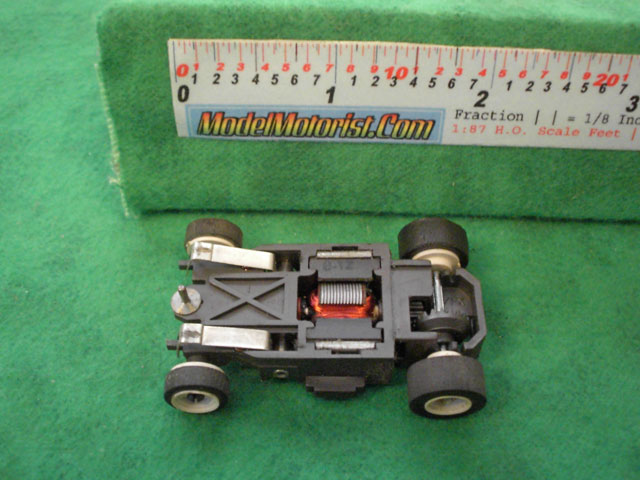 Bottom view of Aurora AFX SP-1000 Slot Car Chassis