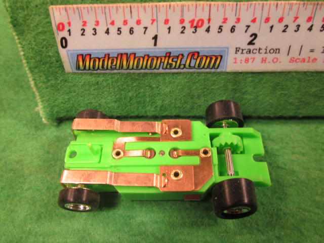 Bottom view of Dash T 2.0 Neon Green HO Slot Car Chassis