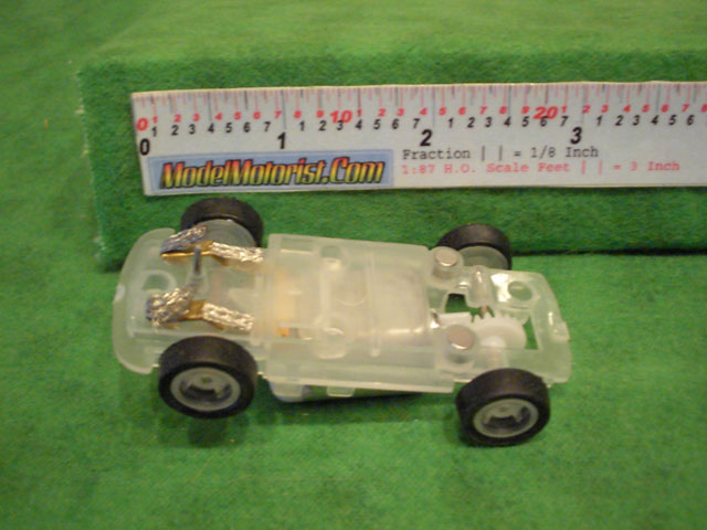 Bottom view of JJ Toys Lighted HO Slot Car Chassis