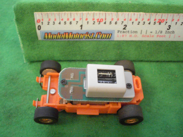 Top view of MR1 Racing Orange 911 HO Slot Car Chassis